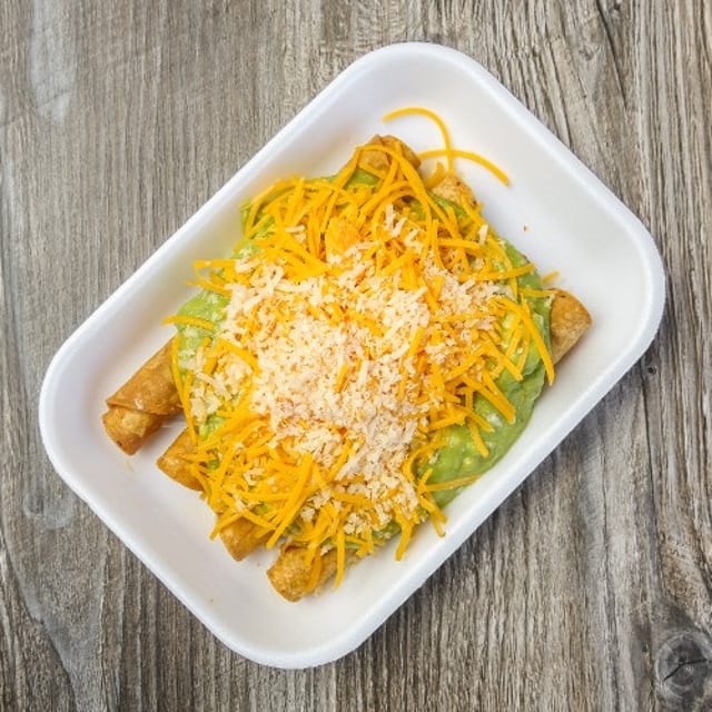 3 BEEF ROLLED TACOS GUACAMOLE.
